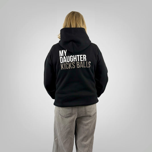 MY DAUGHTER KICKS BALLS: THE STORY BEHIND THE PRINT