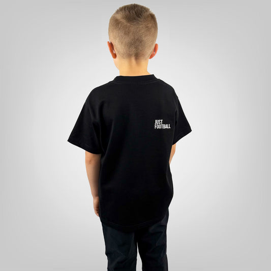 JUST FOOTBALL Boys T-Shirt in black with JUST FOOTBALL back print, rear view on grey background