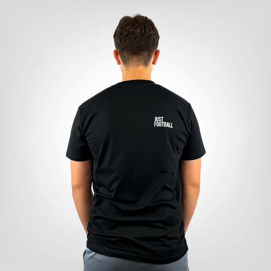 JUST FOOTBALL men's black t-shirt with large JUST FOOTBALL back print, rear view on light grey background