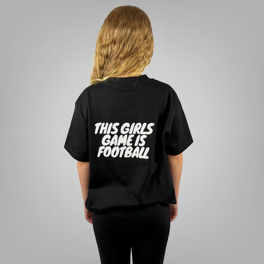 THIS GIRLS GAME IS FOOTBALL girls black t-shirt with large back print, rear view on light grey background